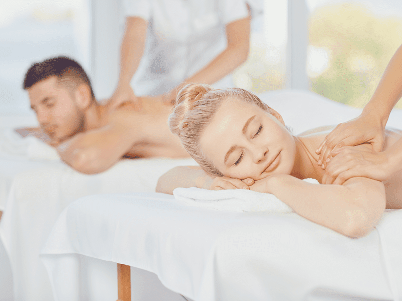 A young Caucasian couple from Los Angeles getting in room massages in Las Vegas