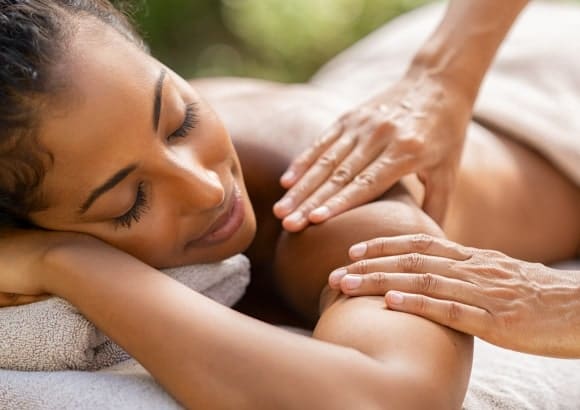 Woman receiving a mobile massage in Las Vegas outside