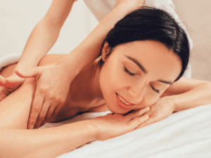 A woman getting a mobile massage in Los Angeles at her home