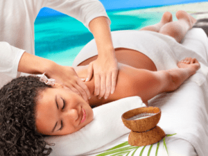 A woman getting a massage in Santa Monica at her beach home