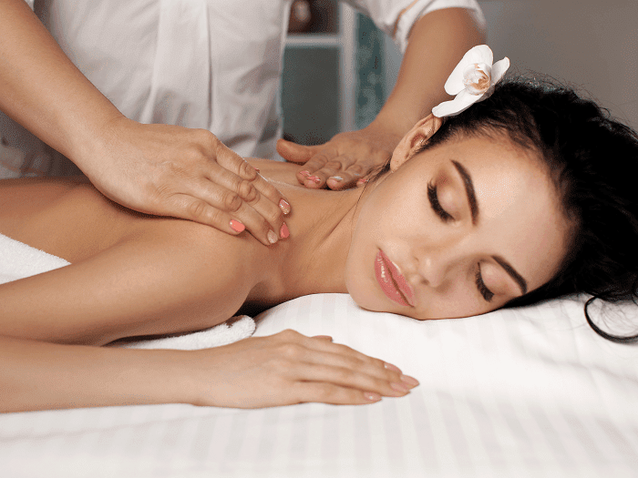 A woman having a massage Venice, CA at her home in