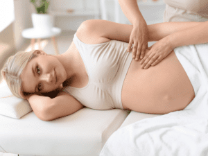 A woman receiving the best prenatal massage in Las Vegas at her home