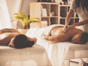 A couple enjoying an in room couples massage in Las Vegas