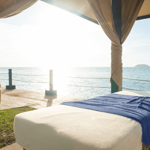 A picture of an in-home massage therapist massage table setup by the ocean in Los Angeles