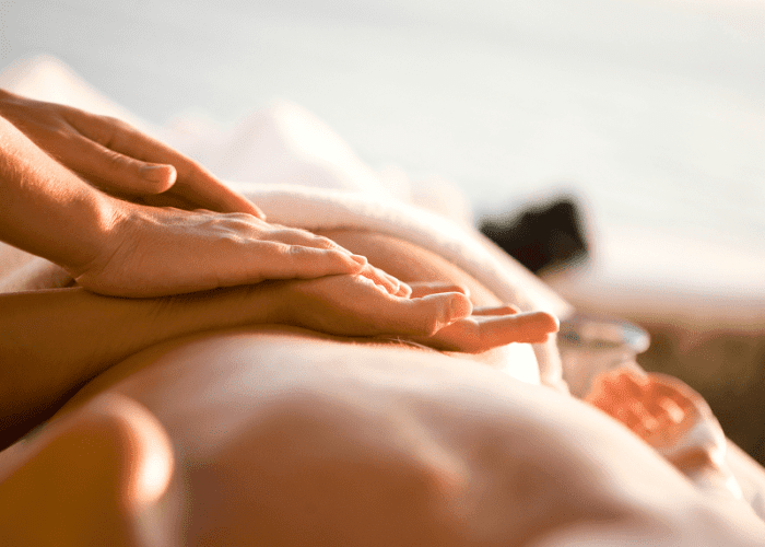 A woman getting the best massage in West Hollywood from a Tranquil massage therapist