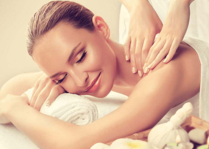 A picture of a woman receiving a massage in Las Vegas during the day