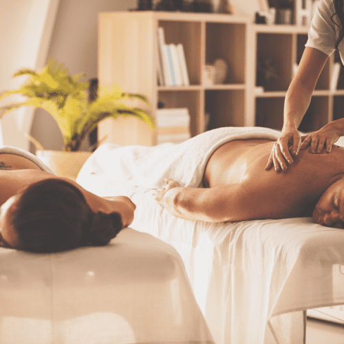 A couple enjoying a mobile massage at their home in Burbank, CA