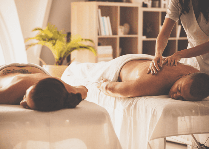 This picture of a couple receiving a couples massage represents something cool and crazy for couples to do in Las Vegas