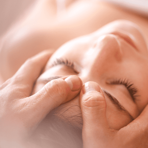 A woman from Las Vegas getting a massage at a spa in Los Angeles