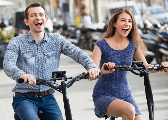 This is a picture of a couple on an electric bike tour in LA that represents a once in a lifetime thing to do in Los Angeles