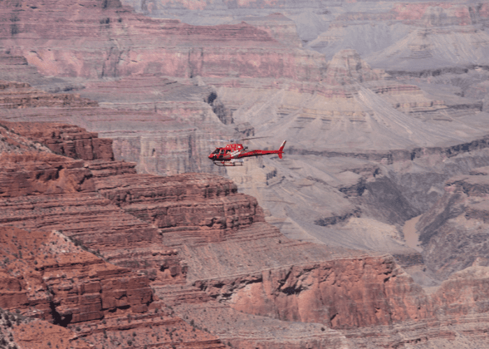This is a picture of a couple taking a helicopter tour of the Grand Canyon in Las Vegas