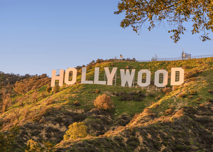 This a picture of the Hollywood sign in Los Angeles from a tour of LA that represents a once in a lifetime thing to do in Los Angeles