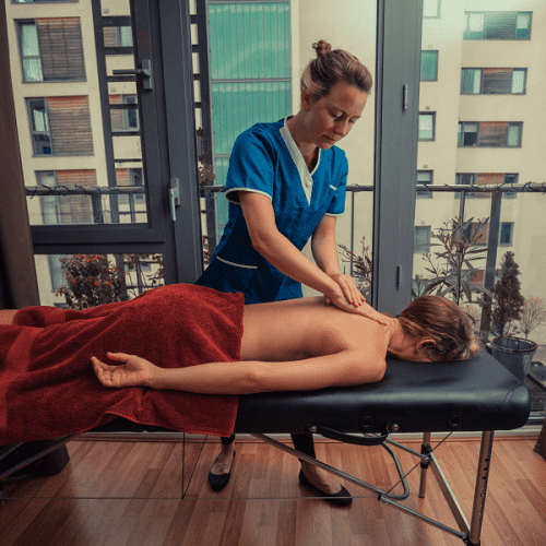 A woman getting an on-demand mobile massage in Los Angeles
