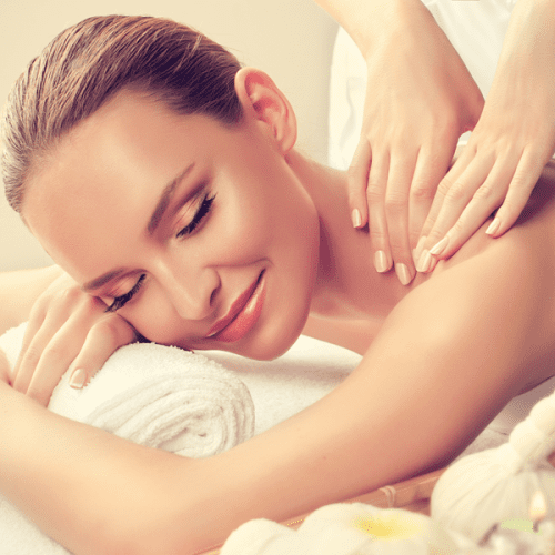 A woman enjoying a massage at her home in Burbank, CA.