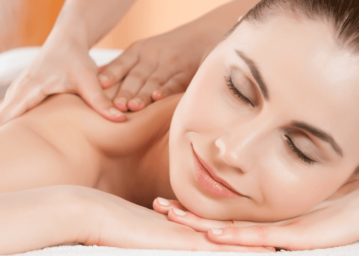 A woman getting a massage at her home in Pasadena, CA