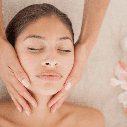 Woman getting a head massage in Los Angeles