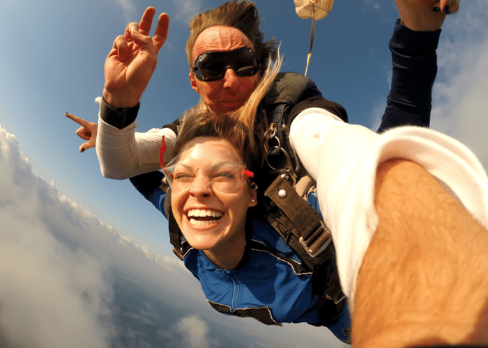 This is a picture of people skydiving that represents a once in a lifetime thing to do in Los Angeles