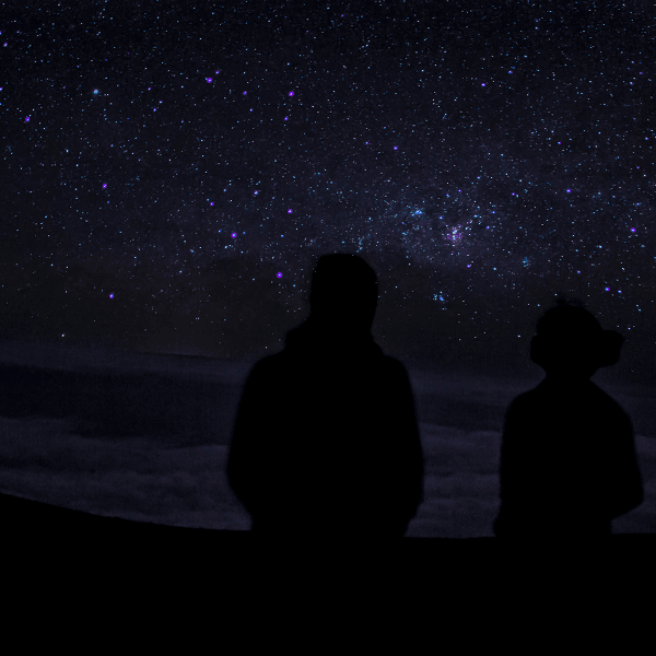 A couple from Los Angeles that works as mobile massage therapists star gazing on vacation at Sunrise Mountain in Las Vegas